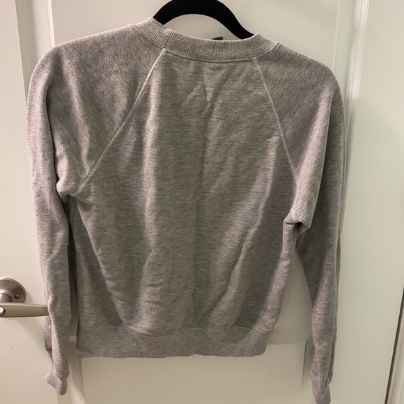 Size small grey sweatshirt. Good condition - Picture 2 of 2